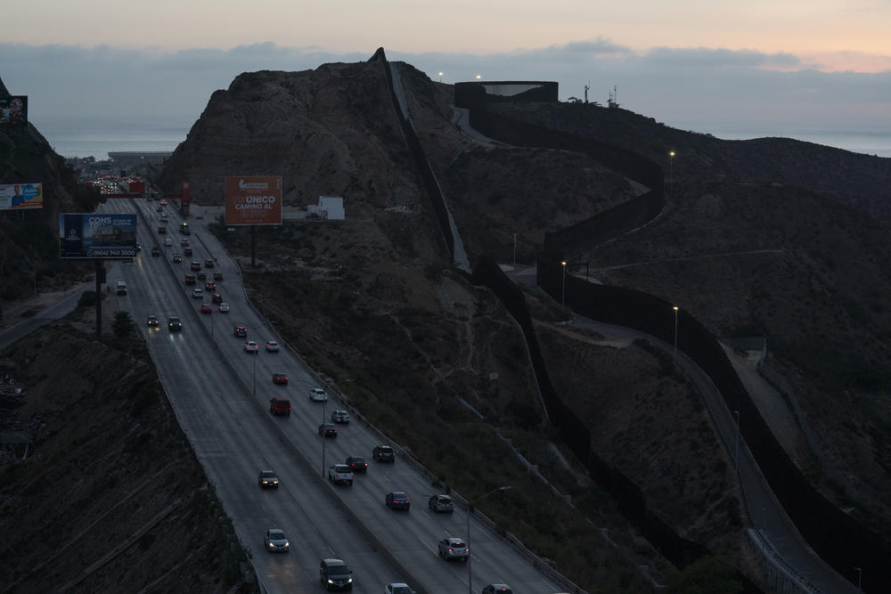 The sun sets in Tijuana, Baja California, on the border with San Diego.