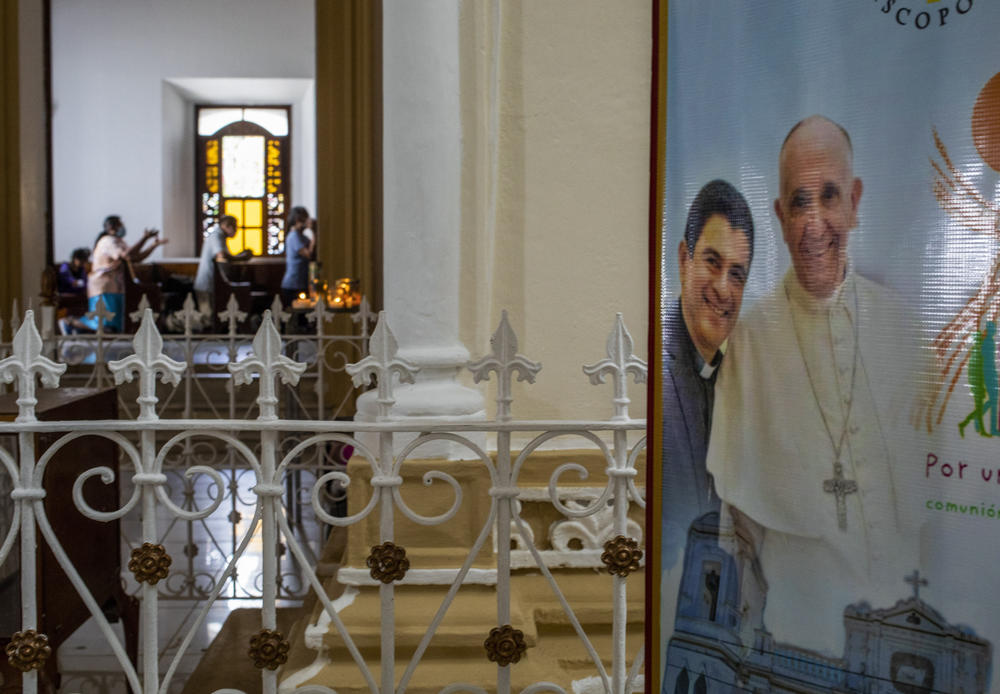 A poster featuring Bishop Rolando Álvarez and Pope Francis hangs inside the Cathedral in Matagalpa, Nicaragua, on Friday.