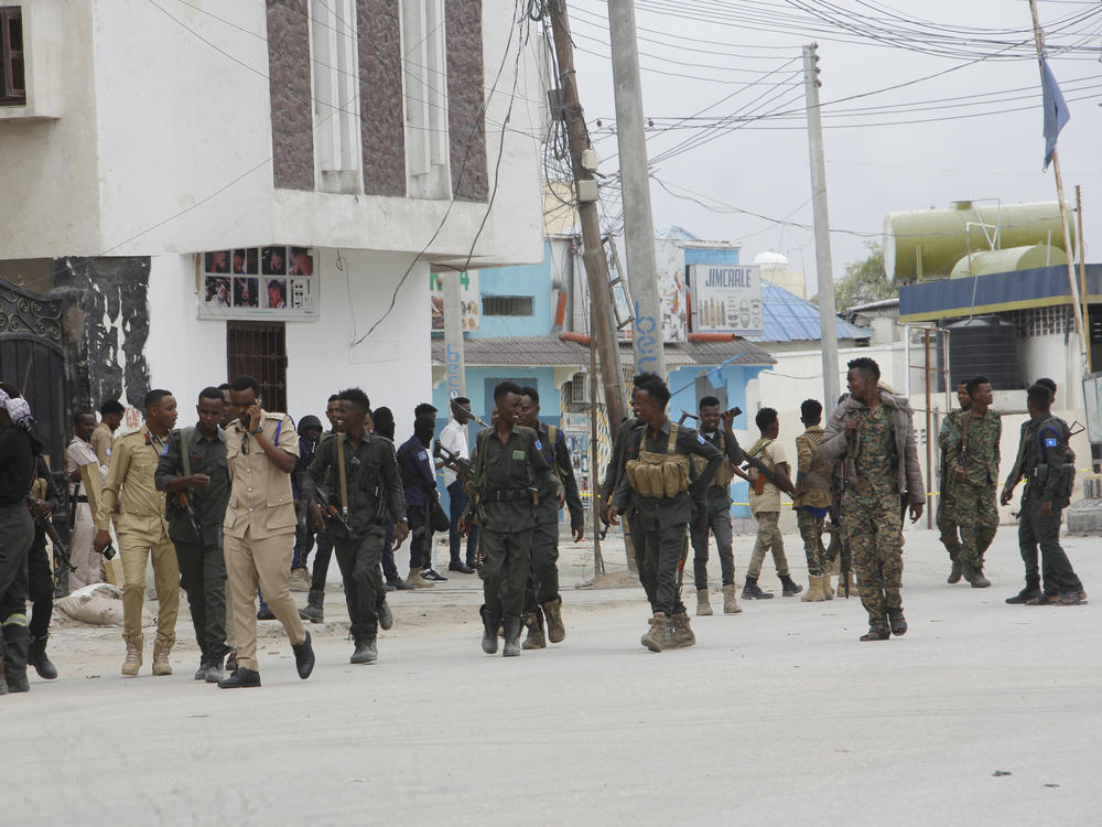 Soldiers patrol outside the Hayat Hotel in Mogadishu, Somalia, on Saturday.