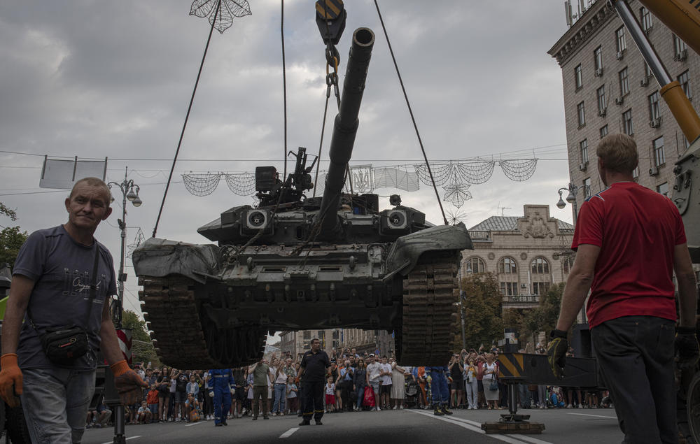 Drawing the attention of large numbers of pedestrians and amateur photographers in downtown Kyiv a large column of burned out and captured Russian tanks and infantry carriers were displayed.