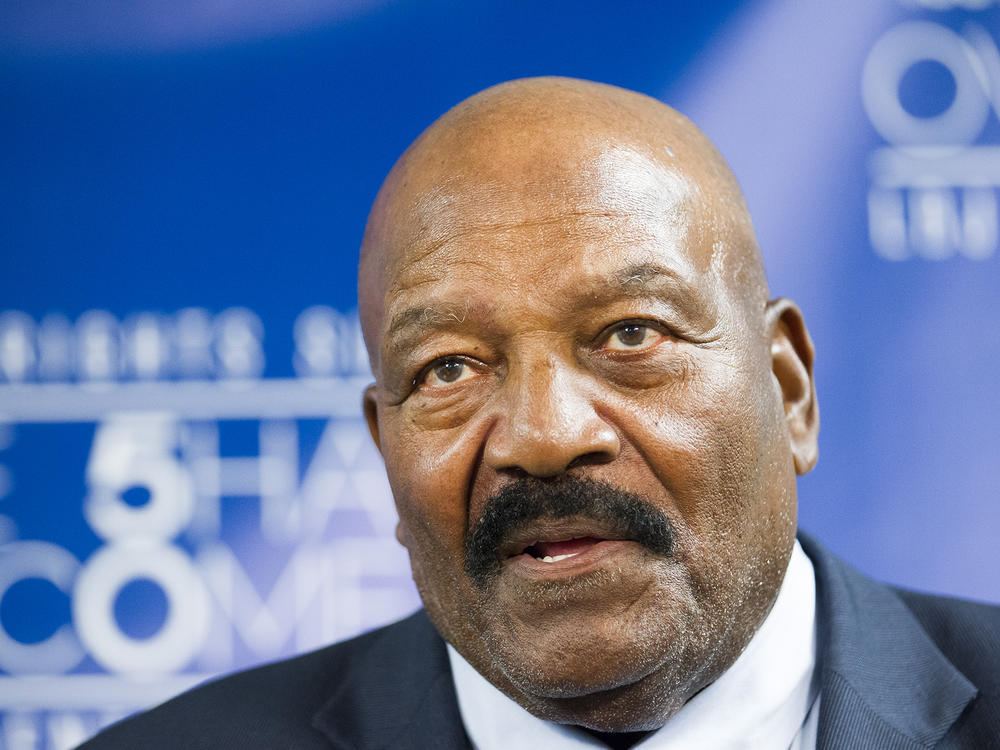 Jim Brown speaks during a press conference after a panel discussion with Bill Russell and Dr. Harry Edwards during a Civil Rights Summit at the LBJ Presidential Library in 2014.