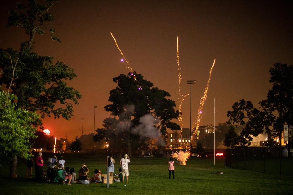 Most people in the United States live in cities. And most people who live in urban areas primarily get outside by going to city parks. Climate change is putting pressure on people and parks alike. On a warm night in Washington, D.C. neighbors gather to put on their own July fireworks display.