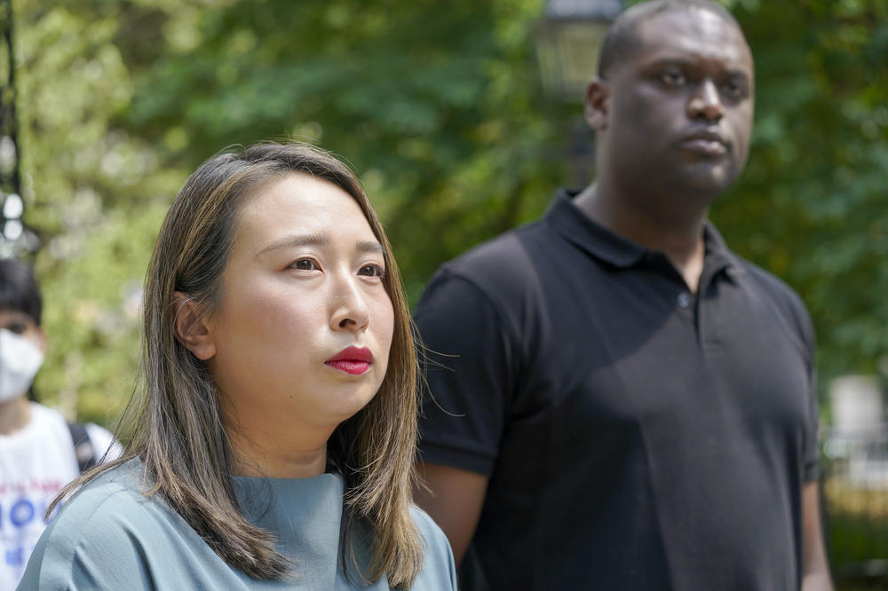 Assemblywoman Yuh-Line Niou, left, and Rep. Mondaire Jones stand together during an Aug. 15 news conference to speak out against Dan Goldman's candidacy in the Democratic primary for New York's 10th District.