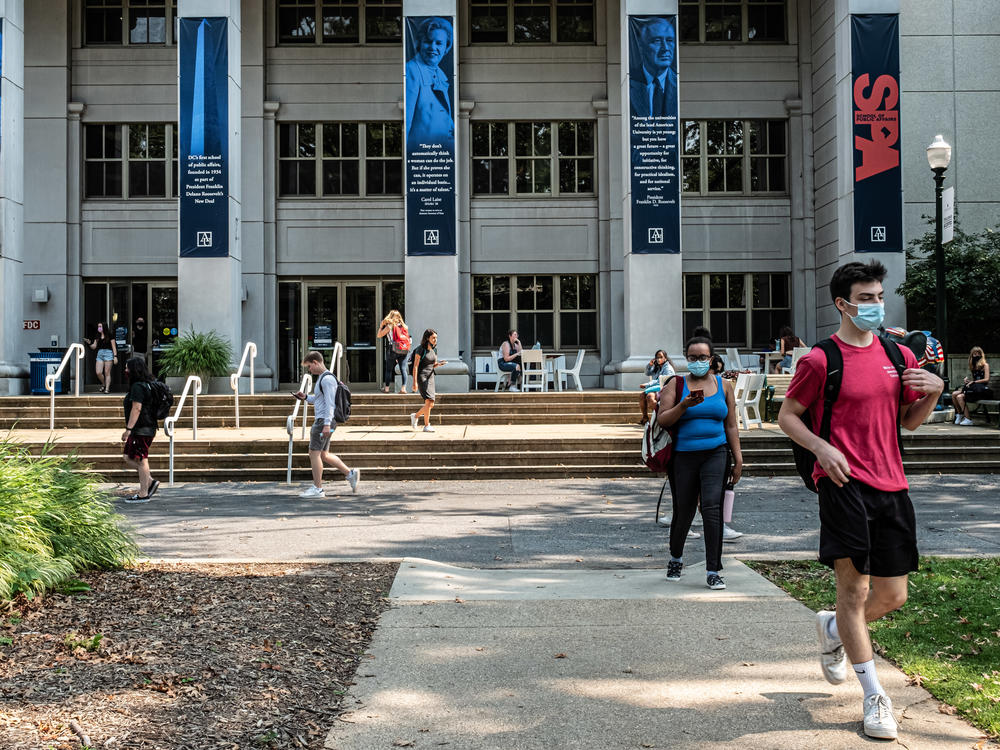 Hundreds of staff members at American University in Washington, D.C., say they are planning to go on strike Monday over complaints of unfair working conditions and low wages. Here, students are seen walking on campus.