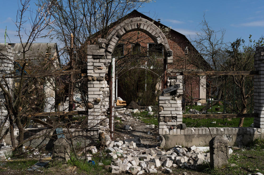 A damaged home in Moshchun, which is tucked into a forest just northwest of Ukraine's capital, in April. Before the Russian invasion, it was a slice of pastoral suburbia, where urbanites had their country cottages and retirees built their dream homes for their golden years.