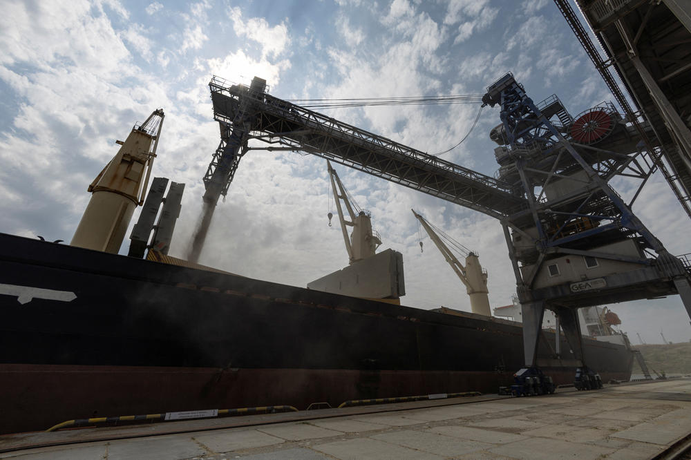 The Lebanese-flagged bulk carrier Brave Commander is loaded with wheat at the port of Pivdennyi, near the Ukrainian city of Odesa, on Aug. 14. The wheat is destined for Ethiopia, thanks to a deal allowing food shipments to depart Ukraine's ports.