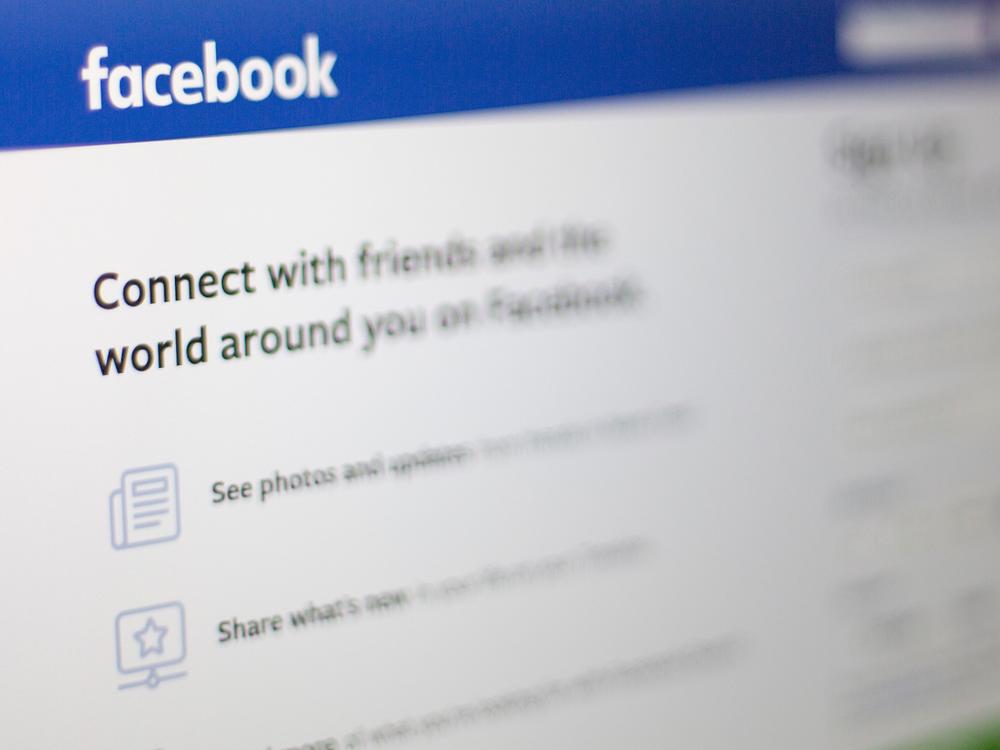 Facebook's parent company, Meta, confirmed an issue with the company's feed after users reported a glitch on their feed showing spam from celebrity pages. Here, the Facebook logo is seen on a computer.