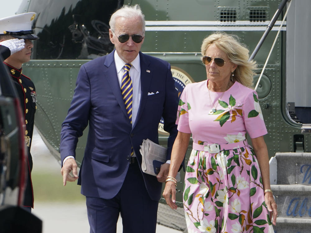 President Joe Biden and first lady Jill Biden exit Marine One at Charleston Executive Airport, S.C., on Aug. 10.