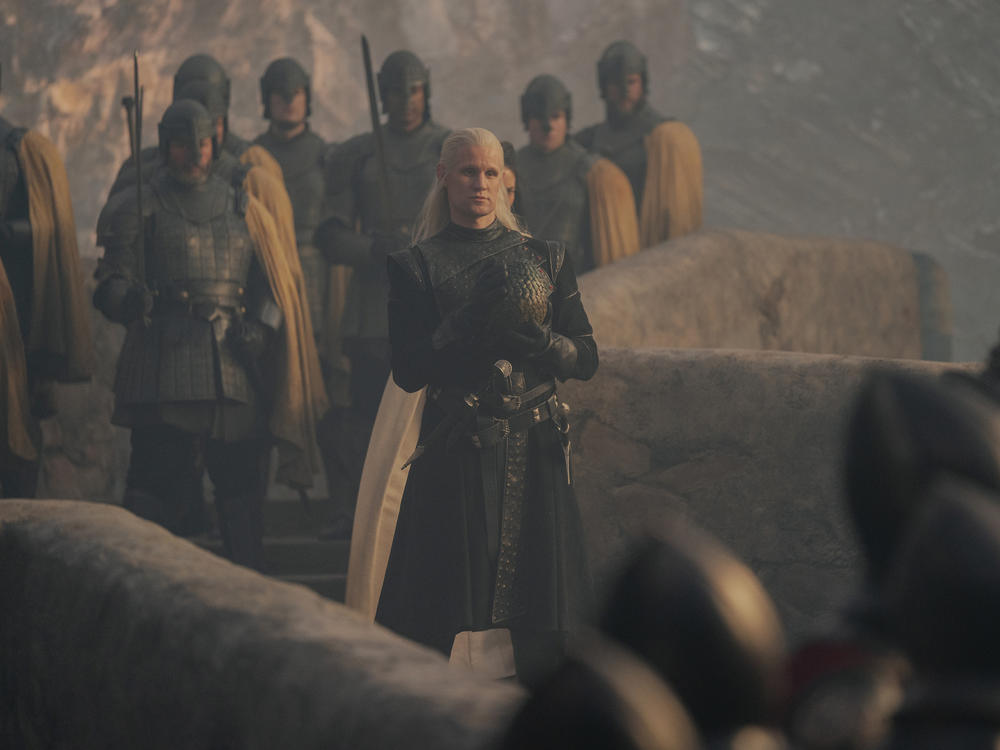 Bridge of Guys: Daemon (Matt Smith) cradles a dragon egg in <em>House of the Dragon</em>.