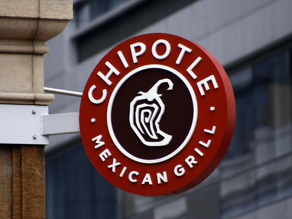 A Chipotle sign hangs outside the chain restaurant in Pittsburgh on Feb. 8, 2016. In June 2022, employees of the Augusta, Maine, Chipotle filed a petition with the National Labor Relations Board asking to hold a union election at the store. The NLRB had scheduled a hearing July 19, 2022. But Chipotle announced the same day it was permanently closing the store.