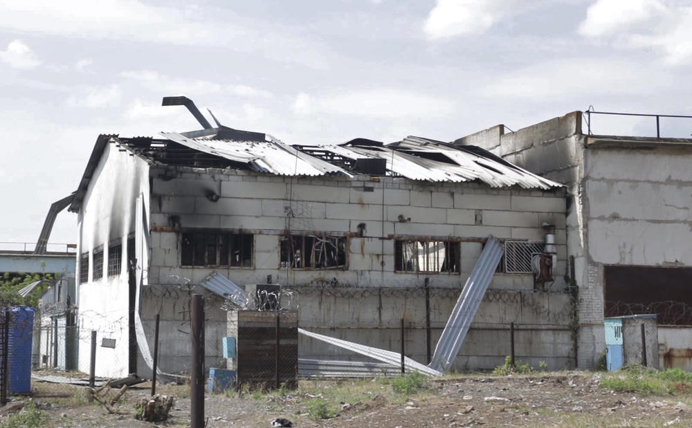 A destroyed barrack at a prison is seen in a photo taken from video, in Olenivka, in eastern Ukraine, on July 29.