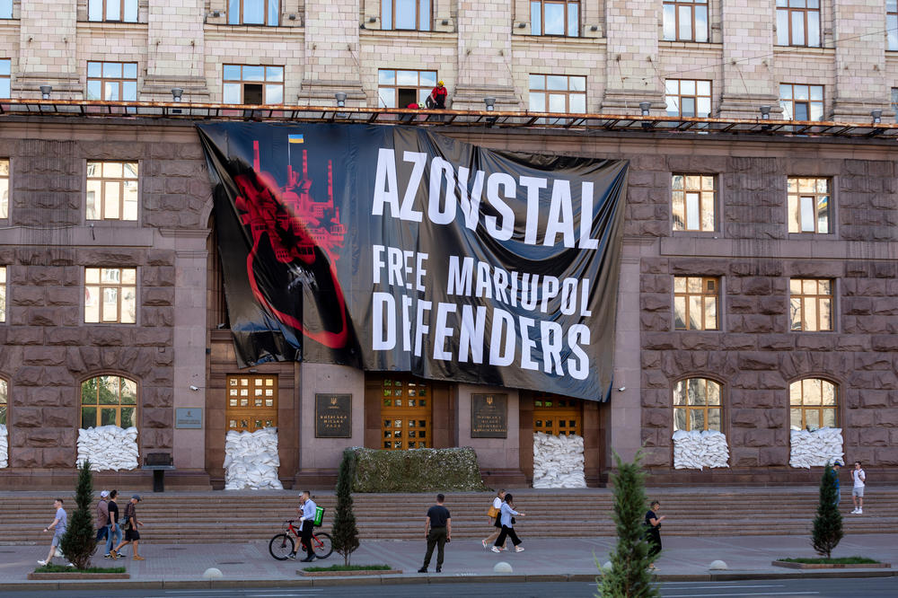 A large billboard with a sign saying 