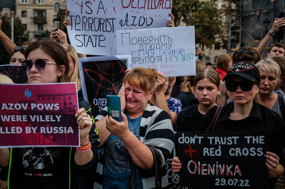 Friends and relatives of Ukraine's Azov battalion service members demonstrate in Kyiv on Aug. 4, following strikes that killed Ukrainian war prisoners in Olenivka.