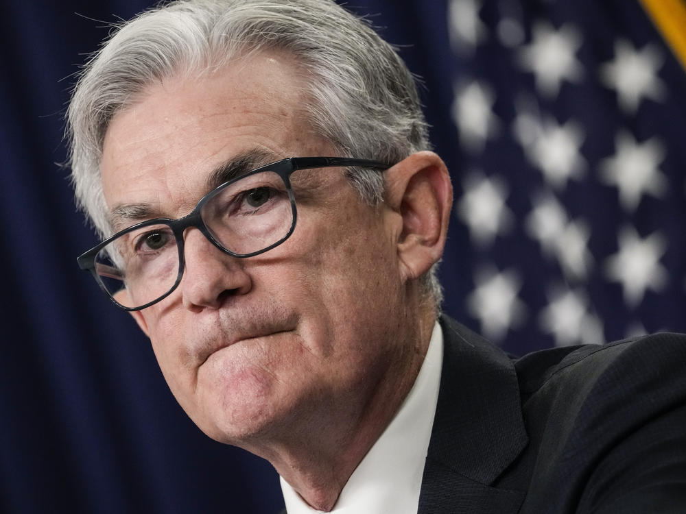 Federal Reserve Chair Jerome Powell speaks during a news conference following a Fed policy meeting in Washington, D.C., on July 27. Powell warned on Friday the central bank is committed to bring down inflation even if it causes some economic pain.