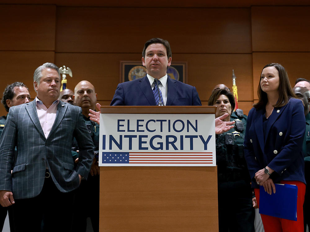 Florida Gov. Ron DeSantis speaks during an Aug. 18 press conference in Fort Lauderdale, where he announced that the state's new Office of Election Crimes and Security was in the process of arresting 20 individuals for voter fraud.