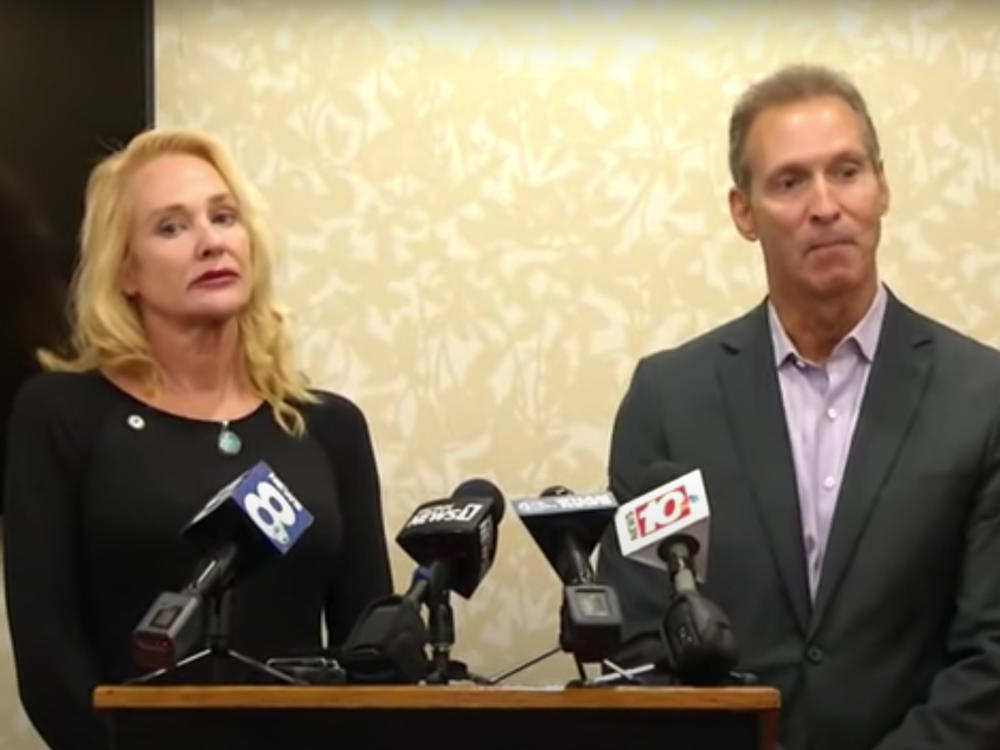 Mary Znidarsic-Nicosia and her husband Nicholas Nicosia, pictured at their press conference in Rochester, NY, on Tuesday. The two deny allegations of racism and now blame 