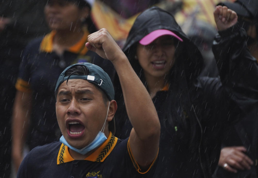 A demonstrator takes part in a march seeking justice for the missing 43 Ayotzinapa students in Mexico City on Friday.