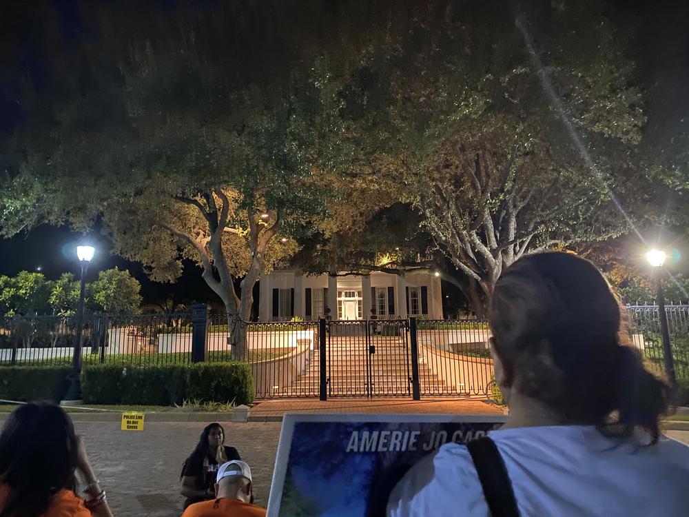 Approximately 20 people gathered outside the governor's mansion in Austin early Saturday morning. The small crowd was made up primarily of families who lost loved ones at the mass shooting in Uvalde. They pleaded that the governor raise the minimum age to purchase AR-15-style rifles.