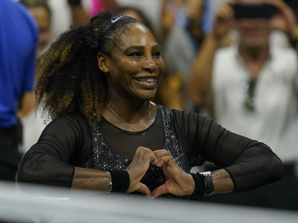 Serena Williams, of the United States, makes a heart with her hands after defeating Danka Kovinic, of Montenegro, during the first round of the US Open tennis championships, Monday, Aug. 29, 2022, in New York.