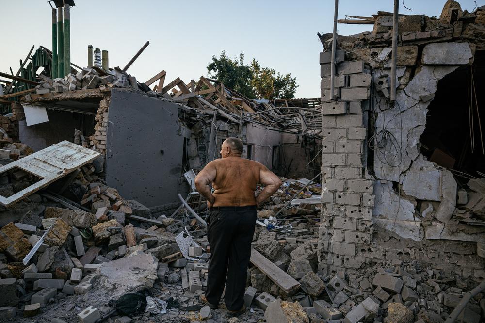 Ukrainian Oleksandr Shulga looks at his destroyed house following a missile strike in the southern city of Mykolaiv on Monday. Ukrainian forces control Mykolaiv, which is about 30 miles northwest of Kherson, which is controlled by Russia. Ukrainian forces on Monday carried out attacks in the south, increasing speculation that a long-promised counteroffensive is beginning.