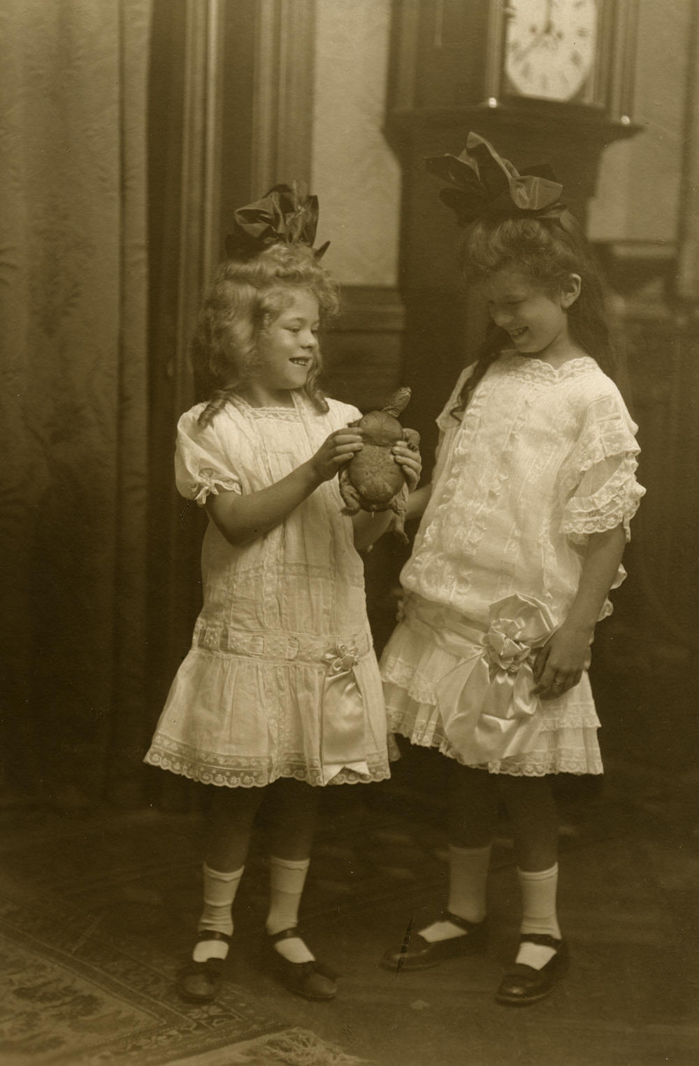 Two children hold a female eastern box turtle in this early 20th century photograph. Despite popular interest in box turtles for over a century, scientists don't know how populations have changed over time.