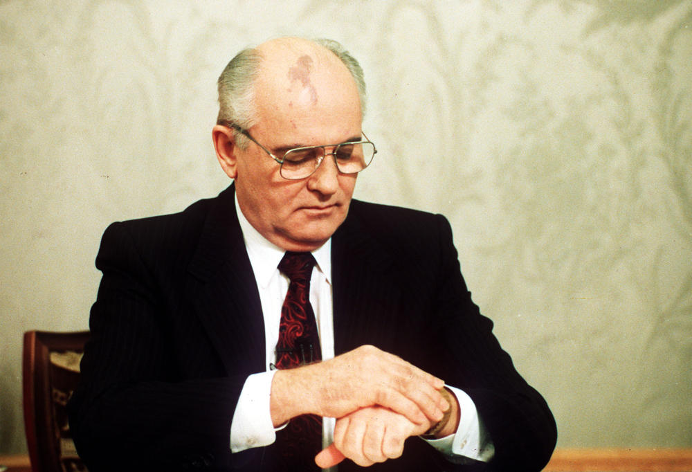 Soviet President Mikhail Gorbachev checks the time on his watch before his resignation speech in the Kremlin, Dec. 25, 1991.