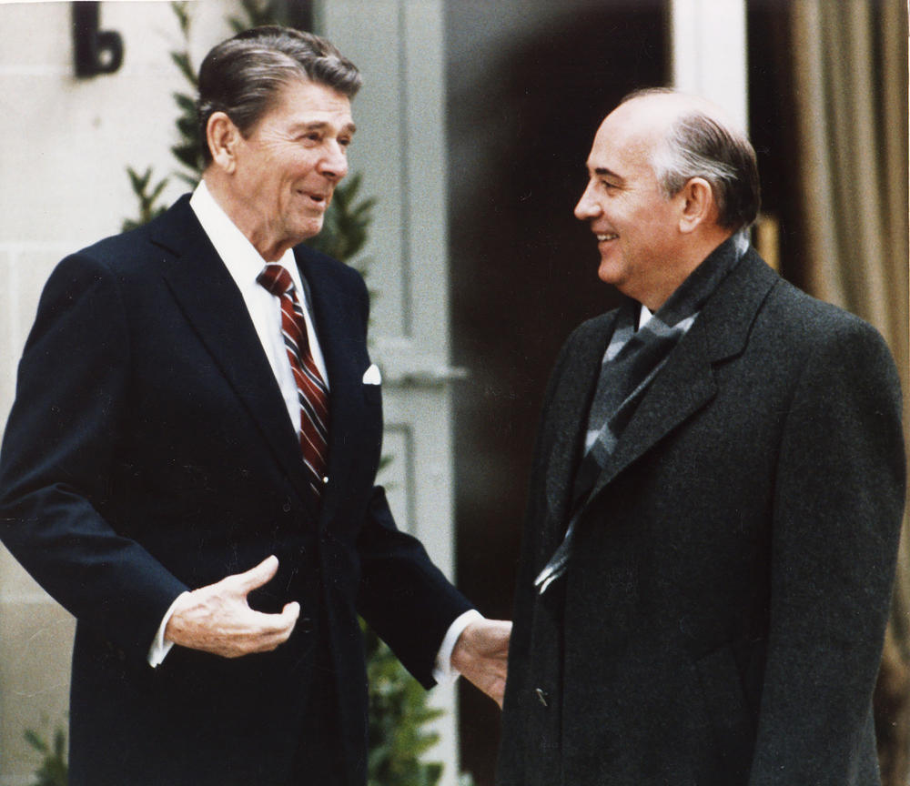 President Ronald Reagan, left, and Soviet leader Mikhail Gorbachev talk during a meeting outside the villa Fleur d'Eau at Versoix, near Geneva, Switzerland, Nov. 19, 1985.