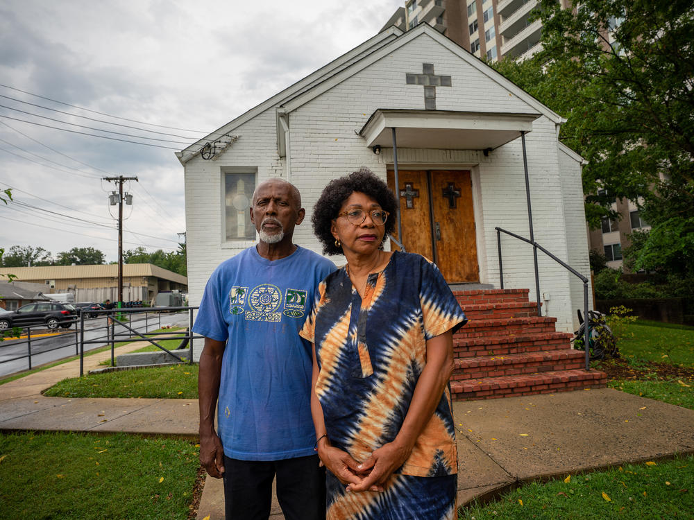 Harvey Matthews was born in the River Road community. He stands with Macedonia Baptist Church First Lady, Marsha Coleman-Adebayo, also president of the Bethesda African Cemetery Coalition. She has led the fight to preserve and prevent further desecration of the cemetery.