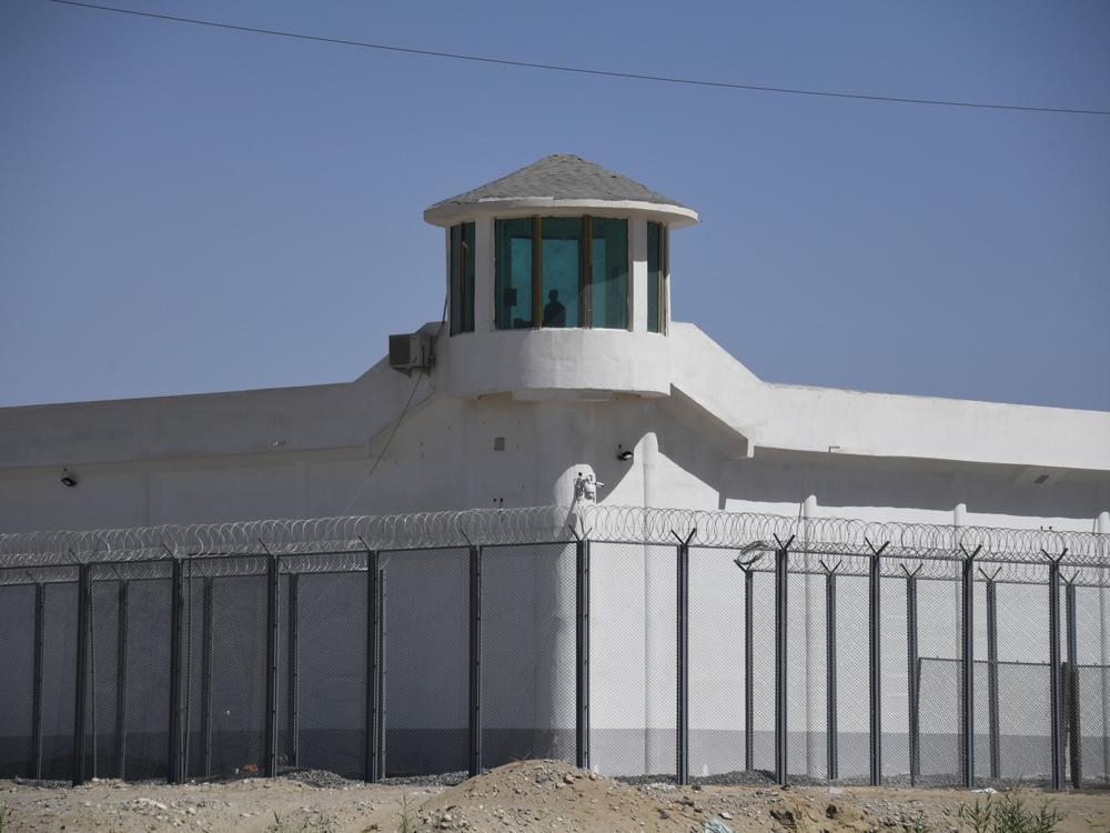 This photo taken on May 31, 2019 shows a watchtower on a high-security facility near what is believed to be a re-education camp where mostly Muslim ethnic minorities are detained, on the outskirts of Hotan, in China's northwestern Xinjiang region. As many as one million ethnic Uyghurs and other mostly Muslim minorities are believed to be held in a network of internment camps in Xinjiang.