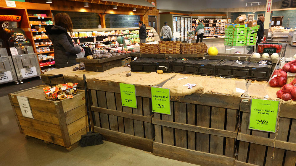 Supply chain snags led to empty shelves during the pandemic, like at this Whole Foods produce department in Vauxhall, N.J., in March 2020. Some people turned to local markets and sellers to purchase foods they couldn't find at the grocery store.