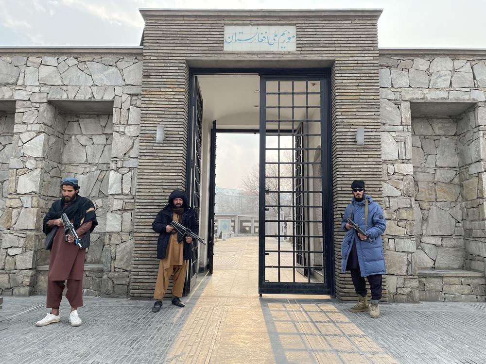 Taliban guards stand at the entrance of the National Museum of Afghanistan after it reopened under Taliban control in Kabul in December.