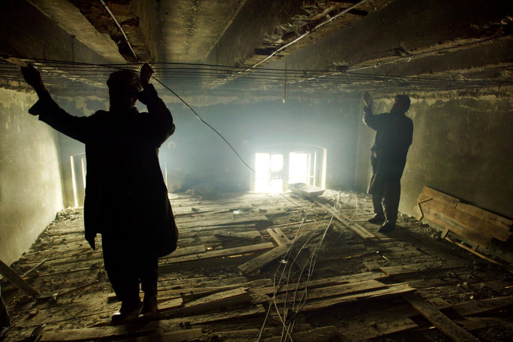 Afghan construction workers put a new ceiling in one of the rooms at the National Museum on Feb. 18, 2003, in Kabul. The museum, which was extensively damaged during heavy fighting in the 1990s, was renovated with international help.