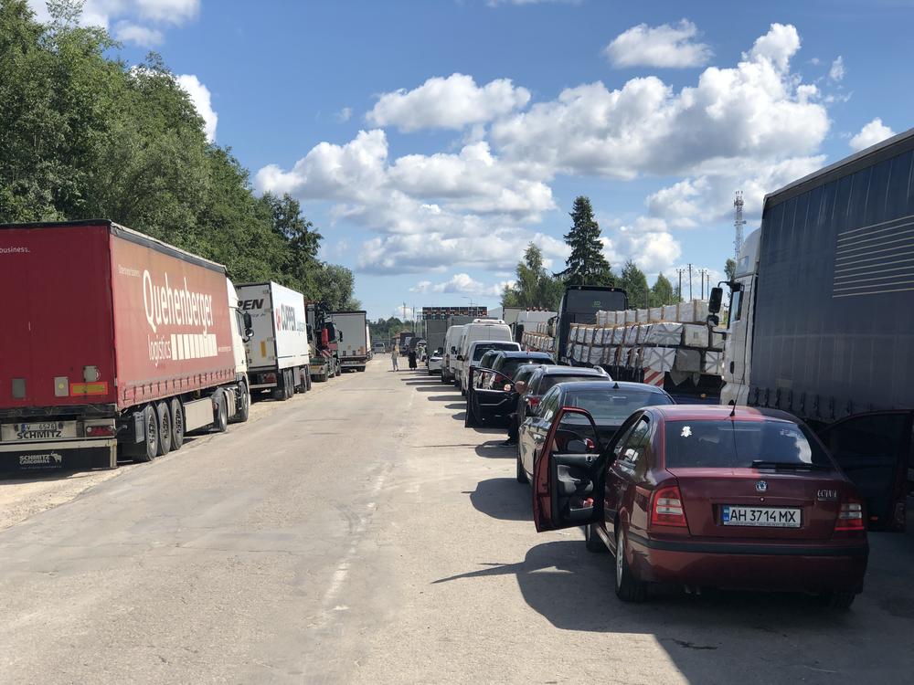 Cars and trucks line up for hours at Latvia's Terehova border crossing into Russia on Aug. 3.