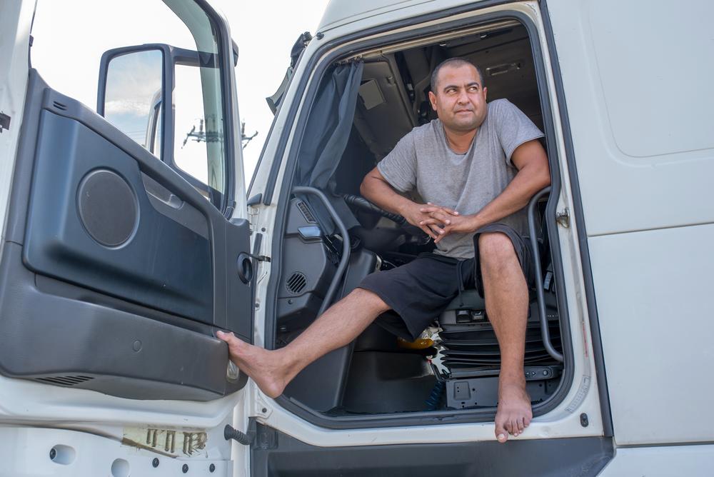 Rustam, a truck driver making his way to Uzbekistan, waits at the Latvia-Russia border in Terehova, Latvia, on Aug. 28. He says that each time he has made this crossing, he has waited at this border for an average of four to five days.