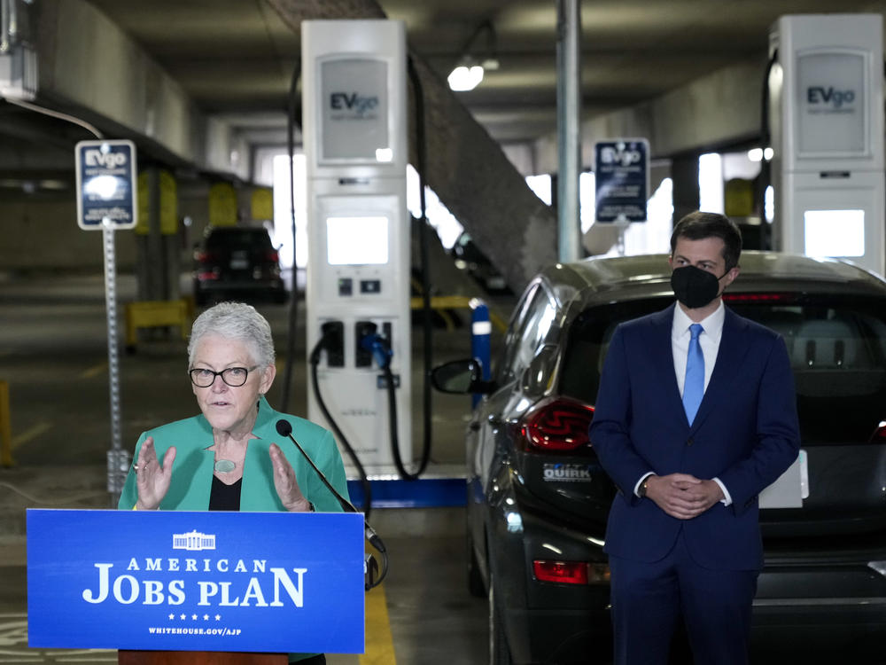 Gina McCarthy, seen here at an April 2021 news conference, was Biden's first national climate adviser. She is stepping down, and her deputy Ali Zaidi is taking on the role.