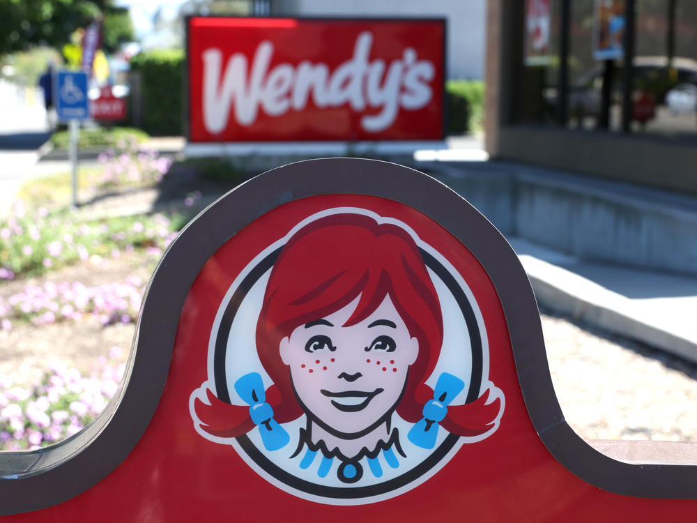 A sign is posted in front of a Wendy's restaurant on August 10, 2022 in Petaluma, California.
