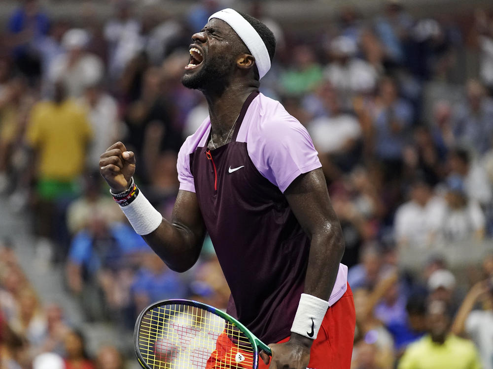 Frances Tiafoe of the United States celebrates after winning a point against Rafael Nadal, of Spain, during the fourth round of the U.S. Open tennis championships, Monday, Sept. 5, 2022, in New York.