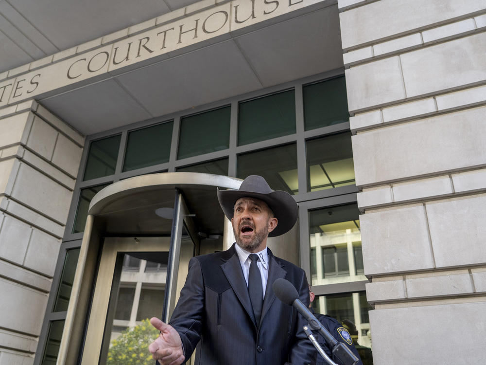 Couy Griffin, a county commissioner in Otero County, New Mexico, speaks on June 17 outside federal court in Washington, D.C., where he was convicted of entering a restricted area during the Jan. 6 riot at the Capitol.
