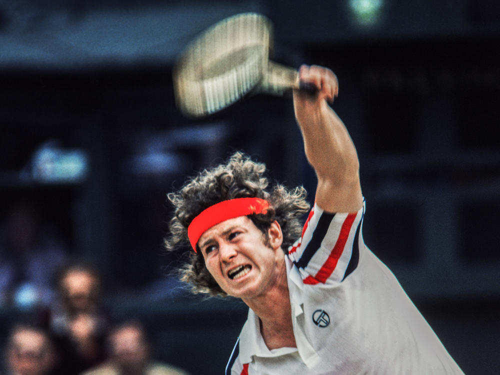 John McEnroe competes at Wimbledon in 1980.