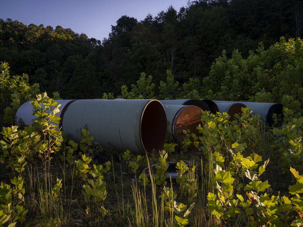 Pipes that have been sitting for four years on the property of impacted landowner Maury Johnson, in Greenville, W.Va., on Thursday, Sept. 1, 2022.