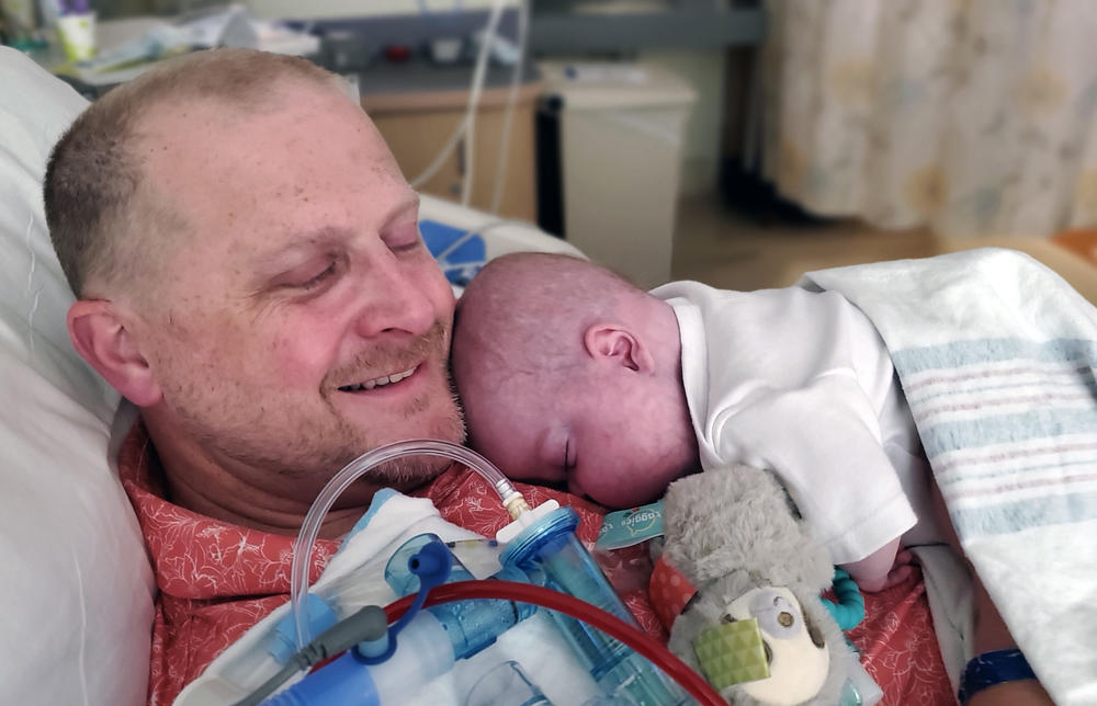 Bennett Markow cuddles with his dad, A.J., hours before the baby died in July 2021 at UC Davis Children's Hospital in Sacramento, Calif.