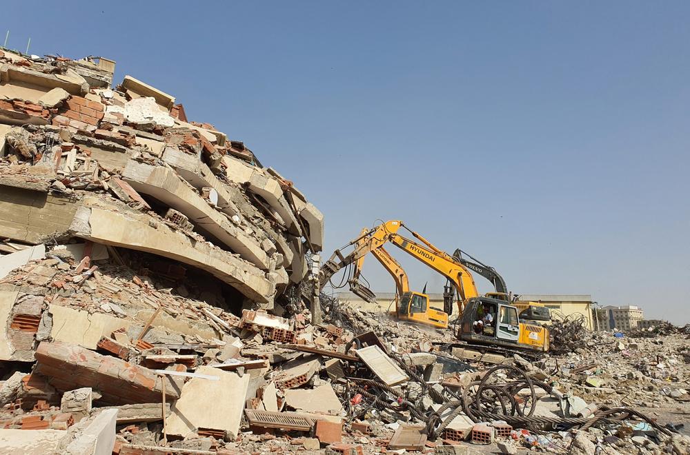 Heavy equipment is used to demolish buildings on March 14 as part of a $20 billion project that stands to displace hundreds of thousands of people in the Saudi city of Jeddah.