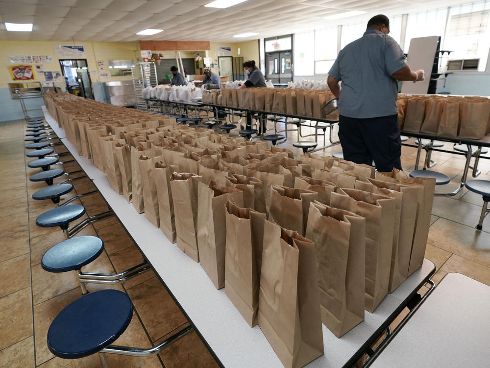 Jefferson County School District Food Service Department staff arrange some of the hundreds of free lunches that was given to students on March 3, 2021 in Fayette, Miss. As one of the most food insecure counties in the United States, many families and their children come to depend on the free meals as their only means of daily sustenance.