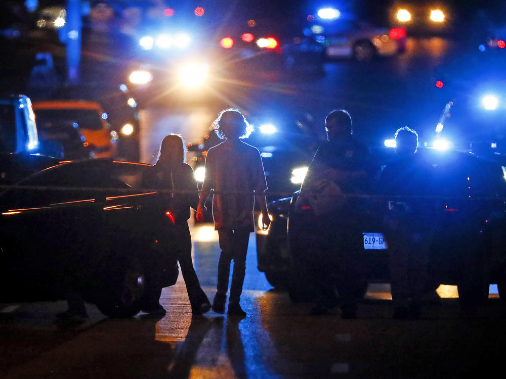 Memphis Police officers work an active shooter scene on Poplar Avenue in Memphis, Tenn., on Wednesday.