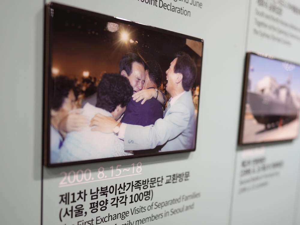 A picture of South and North Korean families' reunion is displayed at the exhibition hall of the unification observatory in Paju, South Korea, Thursday, Sept. 8, 2022.