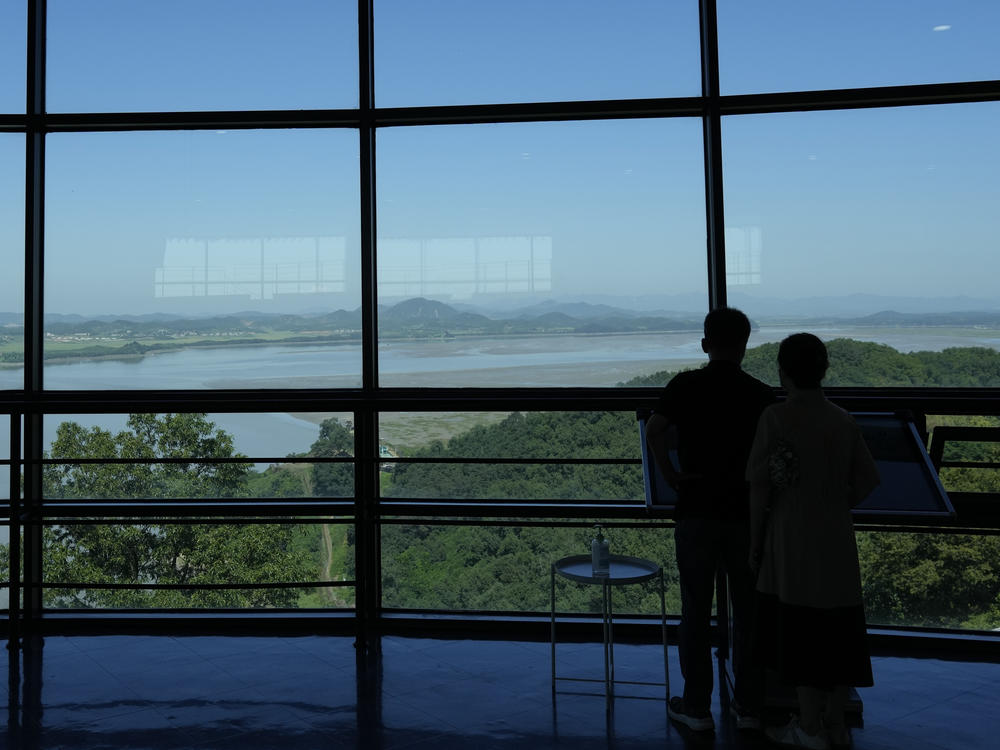 Visitors look at the North Korea side from the unification observatory in Paju, South Korea, Thursday, Sept. 8, 2022.