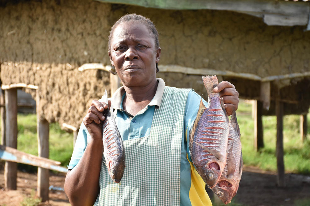 Alice Amonde, the treasurer of the No Sex for Fish cooperative, is one of the few residents of Nduru Beach who have returned after flooding did grievous damage to their homes. Many of the structures in the village have mud walls and tin roofs.