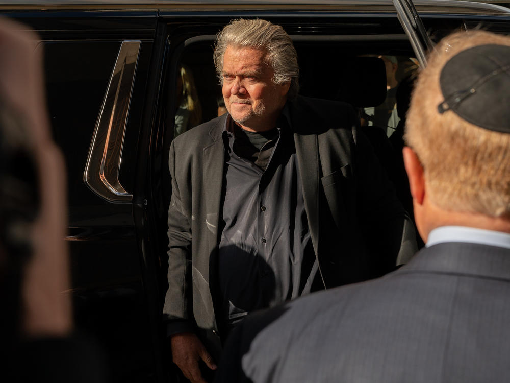 Steve Bannon, former adviser to then-President Donald Trump, arrives at the N.Y. District Attorney's Office to turn himself in on Thursday in New York City. Bannon faces a criminal indictment that mirrors the federal case for which he was pardoned by Trump.