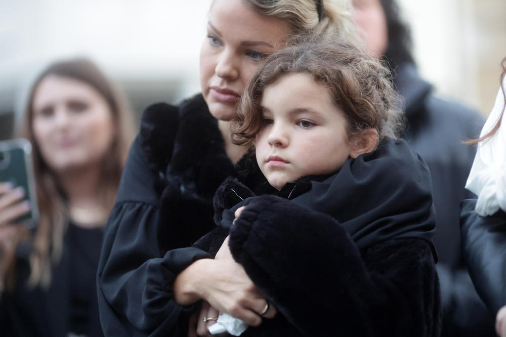 Mourners gather outside Windsor Castle on Thursday.