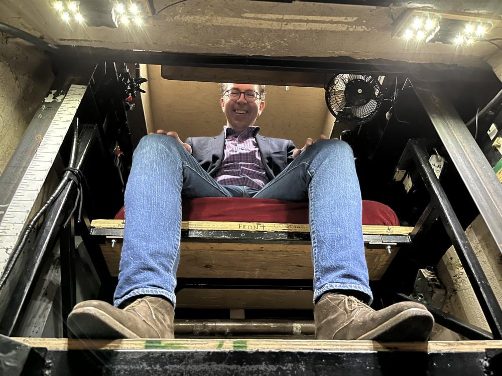 San Francisco Opera prompter Matthew Piatt sits in the prompter's box at the War Memorial Opera House.